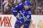 VANCOUVER, CANADA - APRIL 4: Henrik Sedin #33 of the Vancouver Canucks makes a pass during the NHL game against the Minnesota Wild on April 04, 2010 at General Motors Place in Vancouver, British Columbia, Canada.  (Photo by Rich Lam/Getty Images)