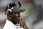 NASHVILLE, TN - AUGUST 15: Raheem Morris, head coach of the Tampa Bay Buccaneers watches the action from the sideline against the Tennessee Titans during a preseason NFL game at LP Field on August 15, 2009 in Nashville, Tennessee. The Titans beat the Buccaneers 27-20. (Photo by Joe Murphy/Getty Images) 