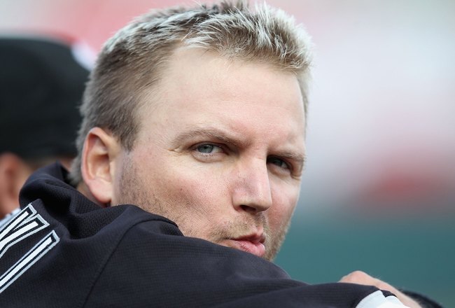 PHOENIX - MARCH 10:  A.J. Pierzynski #12 of the Chicago White Sox sits in the dugout during the MLB spring training game against the Oakland Athletics at Phoenix Municipal Stadium on March 10, 2010 in Phoenix, Arizona. The White Sox defeated the A's 9-5  (Photo by Christian Petersen/Getty Images)
