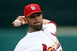 JUPITER, FL - MARCH 29:  Pitcher Jaime Garcia #54 of the St. Louis Cardinals throws against the Minnesota Twins at Roger Dean Stadium on March 29, 2010 in Jupiter, Florida.  (Photo by Marc Serota/Getty Images)