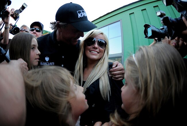 AUGUSTA, GA - APRIL 11:  Phil Mickelson celebrates with his wife Amy and children (L-R) Amanda, Evan and Sophia after his three-stroke victory after winning the 2010 Masters Tournament at Augusta National Golf Club on April 11, 2010 in Augusta, Georgia.  (Photo by Harry How/Getty Images)
