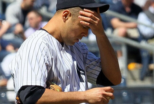 NEW YORK - APRIL 14:  Javier Vazquez #31 of the New York Yankees reacts after giving up a second run in the third inning against the Los Angeles Angels of Anaheim on April 14, 2010 at Yankee Stadium in the Bronx borough of New York City.  (Photo by Jim McIsaac/Getty Images)