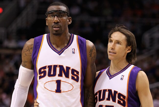 PHOENIX - APRIL 13:  Amar'e Stoudemire #1 and Steve Nash #13 of the Phoenix Suns walk upcourt during the NBA game against the Denver Nuggets at US Airways Center on April 13, 2010 in Phoenix, Arizona. NOTE TO USER: User expressly acknowledges and agrees that, by downloading and or using this photograph, User is consenting to the terms and conditions of the Getty Images License Agreement.  (Photo by Christian Petersen/Getty Images)