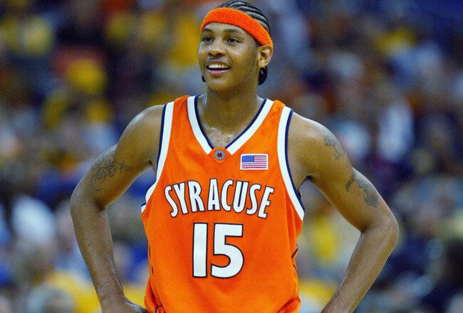 NEW ORLEANS - APRIL 5:  Carmelo Anthony #15 of the Syracuse University Orangeman smiles during the semifinal round of the NCAA Final Four Tournament against the University of Texas at Austin Longhorns at the Louisiana Superdome on April 5, 2003 in New Orleans, Louisiana.  Syracuse defeated Texas 95-84, advancing them to the Championship game.  (Photo by Craig Jones/Getty Images)