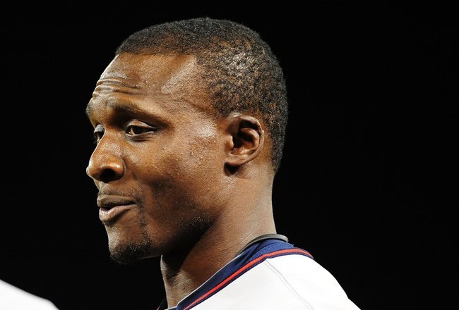 ANAHEIM, CA - APRIL 06:  Orlando Hudson #1 of the Minnisota Twins talks with a teammate while playing against the Los Angeles Angels of Anaheim on April 6, 2010 in Anaheim, California. The Twins defeated the Angels 5-3.  (Photo by Jacob de Golish/Getty Images)