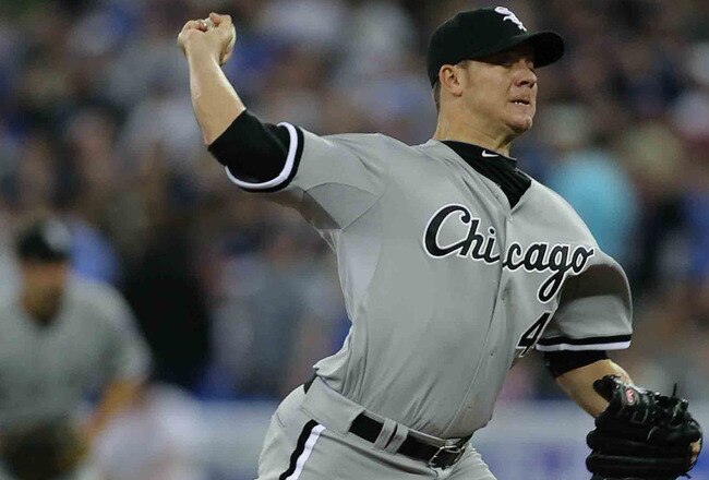 TORONTO - APRIL 12:  Starting pitcher Jake Peavy #44 of the Chicago White Sox throws a pitch against  the Toronto Blue Jays during their MLB game at the Rogers Centre April 12, 2010 in Toronto, Ontario.(Photo By Dave Sandford/Getty Images)