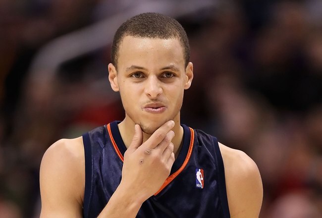 PHOENIX - JANUARY 23:  Stephen Curry #30 of the Golden State Warriors in action during the NBA game against the Phoenix Suns at US Airways Center on January 23, 2010 in Phoenix, Arizona. The Suns defeated the Warriors 112-103.  NOTE TO USER: User expressly acknowledges and agrees that, by downloading and or using this photograph, User is consenting to the terms and conditions of the Getty Images License Agreement.  (Photo by Christian Petersen/Getty Images)