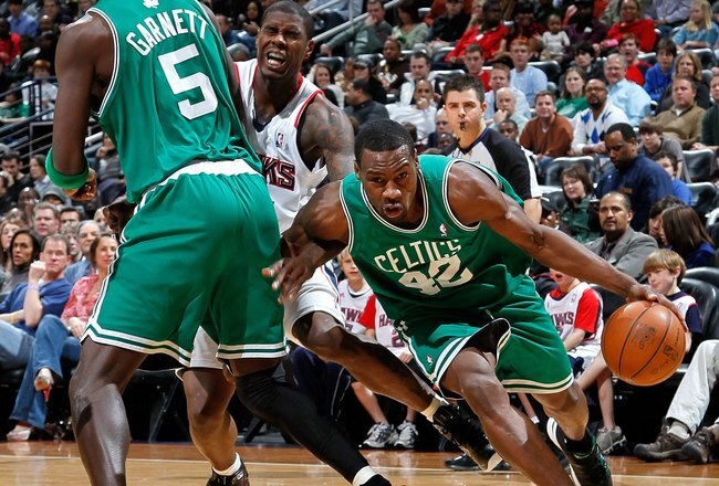 ATLANTA - JANUARY 29:  Kevin Garnett #5 and Tony Allen #42 of the Boston Celtics against Marvin Williams #24 of the Atlanta Hawks at Philips Arena on January 29, 2010 in Atlanta, Georgia.  NOTE TO USER: User expressly acknowledges and agrees that, by downloading and/or using this Photograph, User is consenting to the terms and conditions of the Getty Images License Agreement.  (Photo by Kevin C. Cox/Getty Images)