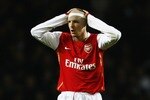 LONDON - JANUARY 31:  Philippe Senderos of Arsenal reacts during the Carling Cup Semi Final Second Leg match between Arsenal and Tottenham Hotspur at the Emirates Stadium on January 31, 2007 in London, England.  (Photo by Shaun Botterill/Getty Images)
