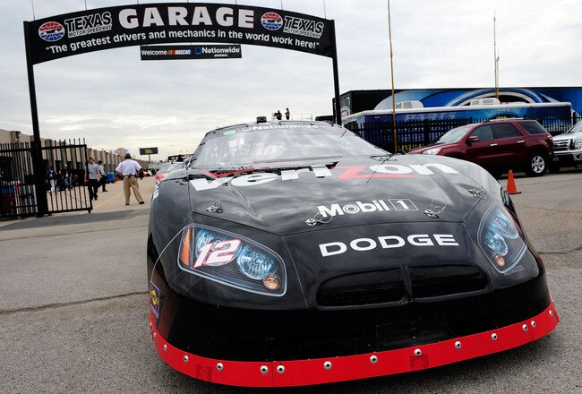 FORT WORTH, TX - APRIL 16:  Justin Allgaier drives the #12 Verizon Wireless Dodge through the garage  during practice for the NASCAR Nationwide Series O'Reilly Auto Parts 300 at Texas Motor Speedway on April 16, 2010 in Fort Worth, Texas.  (Photo by Rusty Jarrett/Getty Images for NASCAR)
