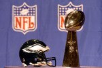 The Eagles helmet and the Vince Lombardi trophy at Andy Reid's press conference on February 4, 2005 at the Prime F. Osborn III Convention Center in Jacksonville, Florida.  (Photo by Al Messerschmidt/Getty Images)