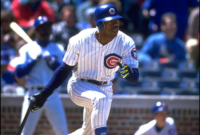 18 May 1994:  Batter Tuffy Rhodes of the Chicago Cubs drops his bat and starts to run to first base after an at bat against the San Diego Padres at Wrigley Field in Chicago, Illinois.  Mandatory Credit:  Jonathan Daniel/Allsport