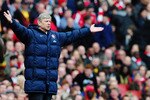 LONDON, ENGLAND - APRIL 03:  Manager of Arsenal, Arsene Wenger gestures during the Barclays Premier League match between Arsenal and Wolverhampton Wanderers at the Emirates Stadium on April 3, 2010 in London, England.  (Photo by Mike Hewitt/Getty Images)