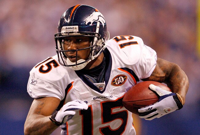 INDIANAPOLIS - DECEMBER 13: Brandon Marshall #15 of the Denver Broncos runs with the ball during the NFL game against the Indianapolis Colts at Lucas Oil Stadium on December 13, 2009 in Indianapolis, Indiana.  The Colts won 28-16.(Photo by Andy Lyons/Getty Images)