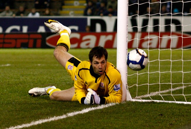 BURNLEY, ENGLAND - MARCH 10: Stoke City goalkeeper Thomas Sorensen fumbles the ball at his near post during the Barclays Premier League match between Burnley and Stoke City at Turfmoor Ground on March 10, 2010 in Burnley, England. (Photo by Jed Leicester/Getty Images)
