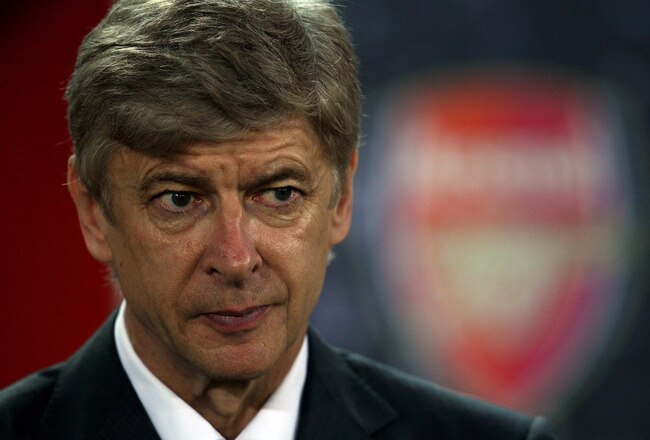 ATHENS, GREECE - DECEMBER 09:  Arsene Wenger the Arsenal Manager looks on before the start of the UEFA Champions League Group H match between Olympiakos and Arsenal at the Georgios Karaiskakis Stadium on December 9, 2009 in Athens, Greece.  (Photo by Richard Heathcote/Getty Images)
