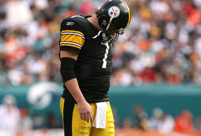 MIAMI - JANUARY 03:  Quarterback Ben Roethlisberger #7 of the Pittsburgh Steelers walks back to the huddle after injuring his shoulder in the fourth quarter against the Miami Dolphins at Land Shark Stadium on January 3, 2010 in Miami, Florida. The Steelers defeated the Dolphins 30-24.  (Photo by Doug Benc/Getty Images)