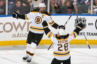 BUFFALO, NY - APRIL 17: Zdeno Chara #33 and Mark Recchi #28 of the Boston Bruins celebrate Chara's goal in the second period against the Buffalo Sabres in Game Two of the Eastern Conference Quarterfinals during the 2010 NHL Stanley Cup Playoffs at HSBC Arena on April 17, 2010  in Buffalo, New York.  (Photo by Rick Stewart/Getty Images)