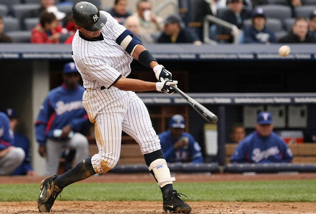 NEW YORK - APRIL 17:  Alex Rodriguez #13 of The New York Yankees hits a home run against The Texas Rangers during their game on April 17, 2010 at Yankee Stadium in the Bronx borough of New York City.  (Photo by Al Bello/Getty Images)