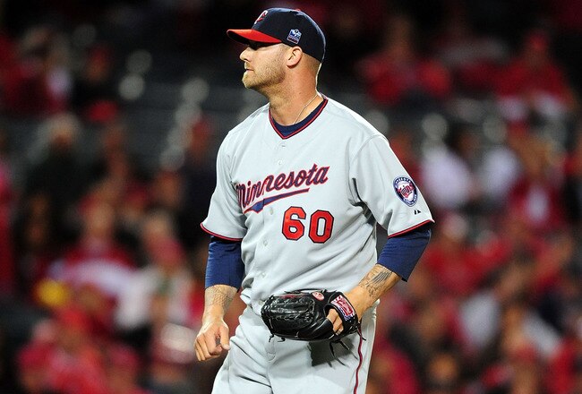 ANAHEIM, CA - APRIL 06: Jon Rauch #60 of the Minnesota Twins pitches in the last inning against the Los Angeles Angels of Anaheim on April 6, 2010 at the Angel Stadium of Anaheim in Anaheim, California.  (Photo by Jacob de Golish/Getty Images)