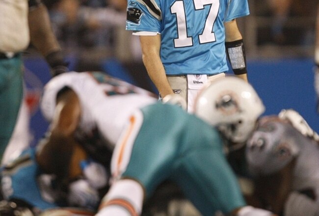 CHARLOTTE - NOVEMBER 19: Quarterback Jake Delhomme #17 of the Carolina Panthers looks on after the Miami Dolphins defense stopped a running play by the Panthers at Bank of America Stadium on November 19, 2009 in Charlotte, North Carolina.  (Photo by Streeter Lecka/Getty Images)