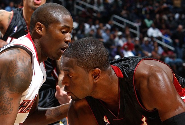 ATLANTA - NOVEMBER 18:  Dwyane Wade #3 of the Miami Heat against Jamal Crawford #11 of the Atlanta Hawks at Philips Arena on November 18, 2009 in Atlanta, Georgia.  (Photo by Kevin C. Cox/Getty Images)