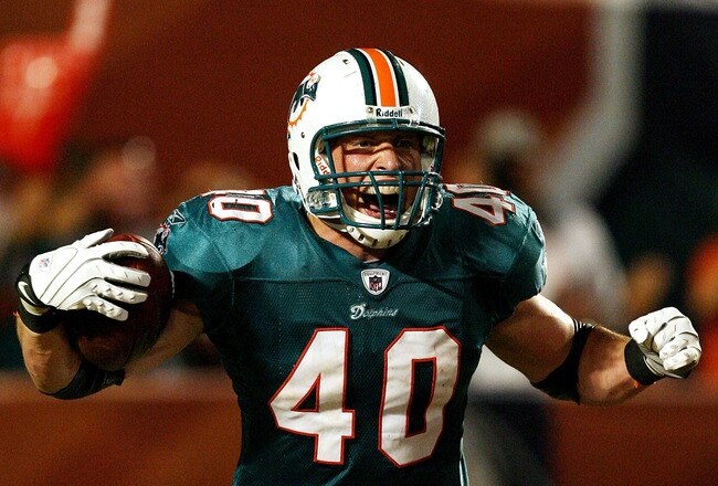 MIAMI - AUGUST 22:  Fullback Joe Kowalewski #40 of the Miami Dolphins celebrates after scoring a touchdown against the Carolina Panthers during a pre-season game at Land Shark Stadium on August 22, 2009 in Miami, Florida. The Dolphins defeated the Panthers 27-17.  (Photo by Doug Benc/Getty Images)