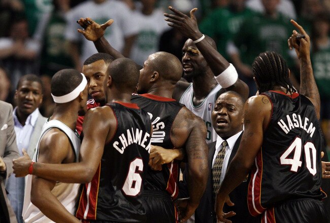 BOSTON - APRIL 17:  Rajon Rondo #9 and Kevin Garnett #5 of the Boston Celtics get into it with Quentin Richardson #5, Udonis Haslem #40 and Mario Chalmers #6 of the Miami Heat during Game One of the Eastern Conference Quarterfinals of the 2010 NBA playoffs at the TD Garden on April 17, 2010 in Boston, Massachusetts. Garnett was given a double technical foul on the incident. The Celtics defeated the Heat 85-76.   (Photo by Elsa/Getty Images)