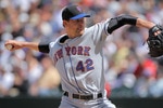 DENVER - APRIL 15:  Starting pitcher Mike Pelfrey #42 of the New York Mets delivers against the Colorado Rockies at Coors Field on April 15, 2010 in Denver, Colorado. All the players in MLB wore #42 today in honor of Jackie Robinson Day.  (Photo by Doug Pensinger/Getty Images)