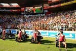 WELLINGTON, NEW ZEALAND - FEBRUARY 06:  Dancers are delivered onto the ground by Harley Davidsons' to entertain the crowd during day two of the Wellington IRB Sevens at Westpac Stadium on February 6, 2010 in Wellington, New Zealand.  (Photo by Ross Land/Getty Images)