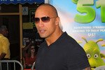 LOS ANGELES, CA - NOVEMBER 14:  Actor Dwayne 'The Rock' Johnson arrives to the premiere of Columbia Pictures' 'Planet 51' at the Mann Village Theatre on November 14, 2009 in Westwood, California.  (Photo by Jason Merritt/Getty Images)