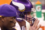 NEW ORLEANS - JANUARY 24:  Brett Favre #4 (C) and Tavaris Jackson #7 of the Minnesota Vikings look on dejected from the bench late in the game against the New Orleans Saints during the NFC Championship Game at the Louisiana Superdome on January 24, 2010 in New Orleans, Louisiana.  (Photo by Ronald Martinez/Getty Images)