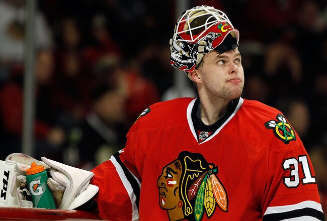 CHICAGO - APRIL 18: Antti Niemi #31 of the Chicago Blackhawks looks up at the replay board during a break in the action against the Nashville Predators in Game Two of the Western Conference Quarterfinals during the 2010 NHL Stanley Cup Playoffs at the United Center on April 18, 2010 in Chicago, Illinois. (Photo by Jonathan Daniel/Getty Images)