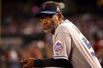 PHOENIX - AUGUST 10:  Manager Jerry Manuel of the New York Mets looks on from the dugout during the game against the Arizona Diamondbacks at Chase Field on August 10, 2009 in Phoenix, Arizona. The Diamondbacks defeated the Mets 7-4.  (Photo by Christian Petersen/Getty Images)