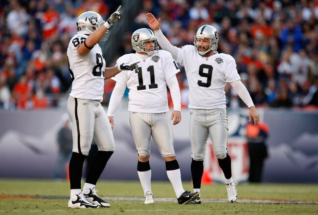 DENVER - DECEMBER 20:  (L-R) Brandon Meyers #83, Sebastian Janikowski #11 and Shane Lechler #9 of the Oakland Raiders celebrate a 54 yard field goal by Janikowski in the second quarter against the Denver Broncos at Invesco Field at Mile High on December 20, 2009 in Denver, Colorado.  (Photo by Jeff Gross/Getty Images)