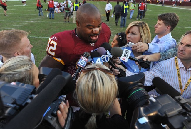 LANDOVER, MD - NOVEMBER 15:  Albert Haynesworth #92 of the Washington Redskins speaks with reporters afetr the game against the Denver Broncos at FedExField on November 15, 2009 in Landover, Maryland. The Redskins won 27-17. (Photo by Larry French/Getty Images)