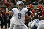 CINCINNATI, OH - DECEMBER 6: Quarterback Matthew Stafford #9 of the Detroit Lions throws under pressure from the Cincinnati Bengals in their NFL game at Paul Brown Stadium December 6, 2009 in Cincinnati, Ohio.    (Photo by John Sommers II/Getty Images)