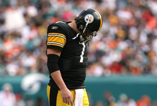 MIAMI - JANUARY 03:  Quarterback Ben Roethlisberger #7 of the Pittsburgh Steelers walks back to the huddle after injuring his shoulder in the fourth quarter against the Miami Dolphins at Land Shark Stadium on January 3, 2010 in Miami, Florida. The Steelers defeated the Dolphins 30-24.  (Photo by Doug Benc/Getty Images)