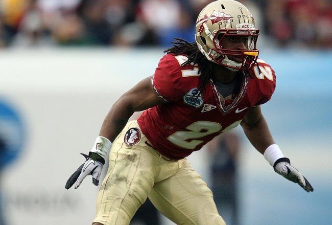JACKSONVILLE, FL - JANUARY 01:  Cornerback Patrick Robinson #21 of the Florida State Seminoles drops back into coverage against the West Virginia Mountaineers during the Konica Minolta Gator Bowl on January 1, 2010 at Jacksonville Municipal Stadium in Jacksonville, Florida. Florida State defeated West Virginia 33-21 in Bobby Bowden's last game as a head coach for the Seminoles.  (Photo by Doug Benc/Getty Images)