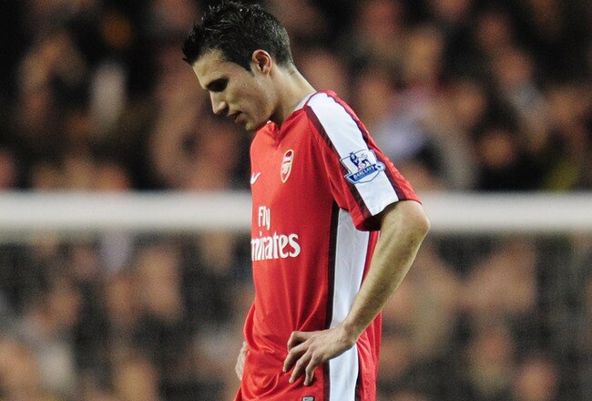 LONDON, ENGLAND - APRIL 14:  Robin Van Persie of Arsenal walks off dejected after the Barclays Premier League match between Tottenham Hotspur and Arsenal at White Hart Lane on April 14, 2010 in London, England.  (Photo by Shaun Botterill/Getty Images)