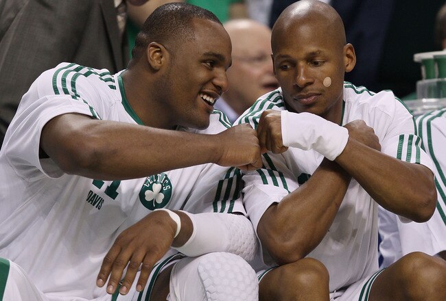 BOSTON - APRIL 20:  Glen Davis #11 and Ray Allen #20 of the Boston Celtics celebrate the win over the Miami Heat during Game Two of the Eastern Conference Quarterfinals of the 2010 NBA playoffs at the TD Garden on April 20, 2010 in Boston, Massachusetts.  The Celtics defeated the Heat 106-77. NOTE TO USER: User expressly acknowledges and agrees that, by downloading and or using this photograph, User is consenting to the terms and conditions of the Getty Images License Agreement.  (Photo by Elsa/Getty Images)