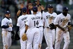SAN DIEGO - APRIL 12:    The San Diego Padres celebrate after the game with the Atlanta Braves on April 12, 2010 at Petco Park in San Diego, California.  The Padres won 17-2.  (Photo by Stephen Dunn/Getty Images)