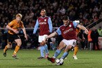 HULL, ENGLAND - APRIL 21:  James Milner of Aston Villa scores the second goal from the penalty spot during the Barclays Premier League match between Hull City and Aston Villa at the KC Stadium on April 21, 2010 in Hull, England.  (Photo by Alex Livesey/Getty Images)