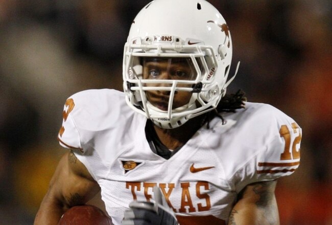 STILLWATER, OK - OCTOBER 31: Earl Thomas #12 of the Texas Longhorns runs with the ball after an interception for a touchdown in the third quarter against the Oklahoma State Cowboys at Boone Pickens Stadium on October 31, 2009 in Stillwater, Oklahoma. (Photo by Ronald Martinez/Getty Images)