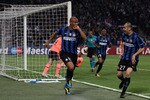 MILAN, ITALY - APRIL 20:  Maicon (C) of Inter celebrates with teammate Goran Pandev (R) after scoring the 2:1 goal during the UEFA Champions League Semi Final 1st Leg match between Inter Milan and Barcelona at the San Siro on April 20, 2010 in Milan, Italy.  (Photo by Julian Finney/Getty Images)