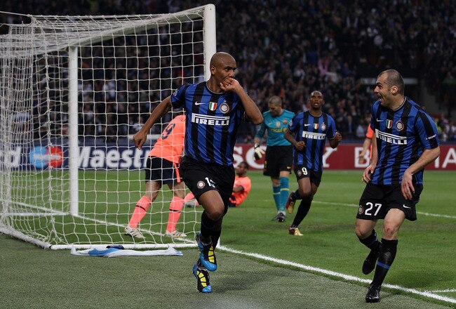 MILAN, ITALY - APRIL 20:  Maicon (C) of Inter celebrates with teammate Goran Pandev (R) after scoring the 2:1 goal during the UEFA Champions League Semi Final 1st Leg match between Inter Milan and Barcelona at the San Siro on April 20, 2010 in Milan, Italy.  (Photo by Julian Finney/Getty Images)