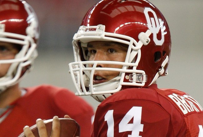 ARLINGTON, TX - SEPTEMBER 05:  Quarterback Sam Bradford #14 of the Oklahoma Sooners warms up before a game against the Brigham Young Cougars at Cowboys Stadium on September 5, 2009 in Arlington, Texas.  (Photo by Ronald Martinez/Getty Images)