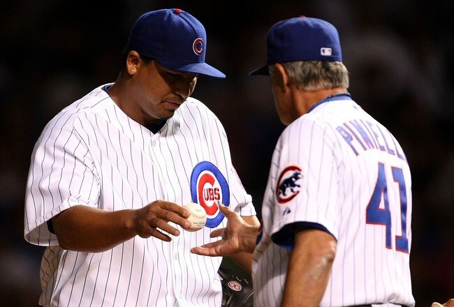 CHICAGO - AUGUST 29: Manager Lou Piniella #41 of the Chicago Cubs takes the ball from pitcher Carlos Zambrano in the 7th inning as he removes him from the game against the Milwaukee Brewers on August 29, 2007 at Wrigley Field in Chicago, Illinois. (Photo by Jonathan Daniel/Getty Images)
