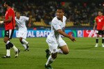RUSTENBURG, SOUTH AFRICA - JUNE 21:  Charlie Davies of USA celebrates after scoring the opening goal during the FIFA Confederations Cup match between Egypt and USA at Royal Bafokeng Stadium on June 21, 2009 in Rustenburg, South Africa.  (Photo by Jamie McDonald/Getty Images)
