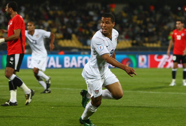 RUSTENBURG, SOUTH AFRICA - JUNE 21:  Charlie Davies of USA celebrates after scoring the opening goal during the FIFA Confederations Cup match between Egypt and USA at Royal Bafokeng Stadium on June 21, 2009 in Rustenburg, South Africa.  (Photo by Jamie McDonald/Getty Images)